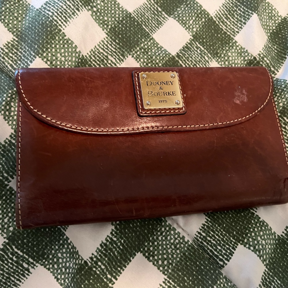 Dooney& Bourke Wallet and checkbook.